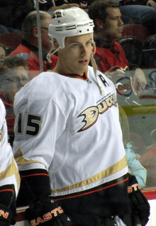 Getzlaf leans forward and observes as his team participates in a pre-game warmup.
