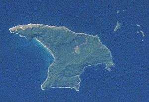 View taken from an orbiting spacecraft showing a roughly triangular-shaped island