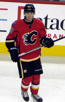 Bennett stares down the ice during pre-game warm-up prior to a Flames exhibition game.