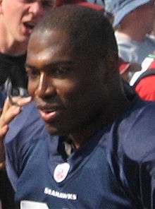 An American football player wearing a blue jersey.