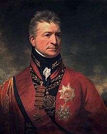 Portrait of general in red coat with high dark blue collar and many decorations