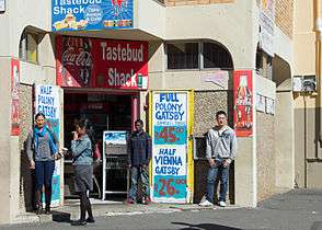 A store in Cape Town, South Africa with signage for Gatsby sandwiches