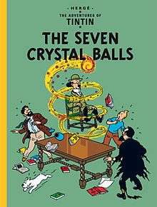 A ball of fire is whirling around Professor Calculus, lifting him while still seated in his chair, as Tintin, Snowy, Captain Haddock, and Professor Tarragon look on.
