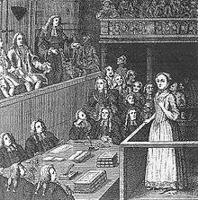 A monochrome sketch of a young woman standing in the dock of a courtroom. The room is filled with wigged men.