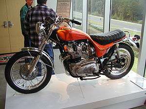 Orange motorcycle in museum