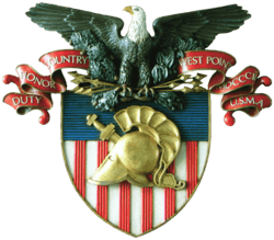 An eagle atop a shield with a scroll that says "Duty, Honor, Country"