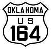 A U.S. route shield in the 1926 style, reading "OKLAHOMA / US / 164".