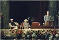 Indian Prime Minister Morarji Desai listens to Jimmy Carter as he addresses the Indian Parliament House.